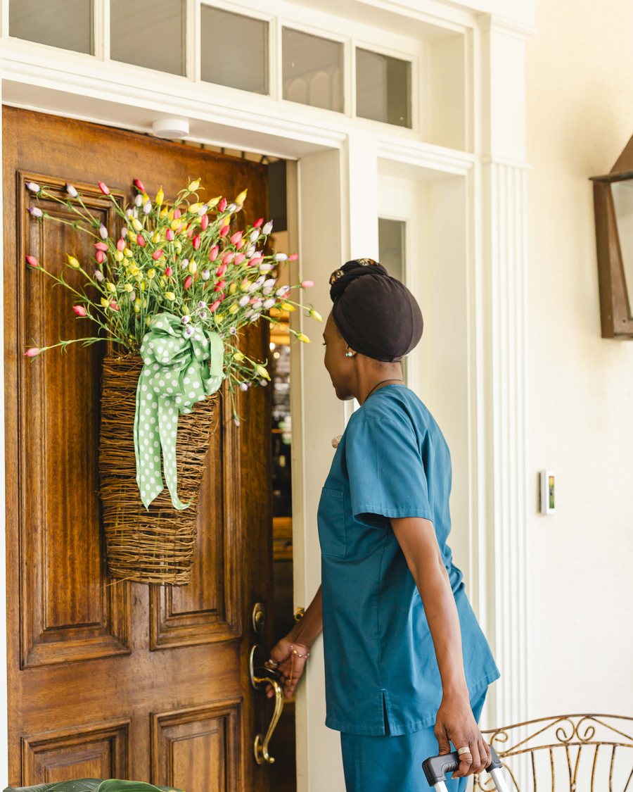 Tidying an entryway with fresh flowers