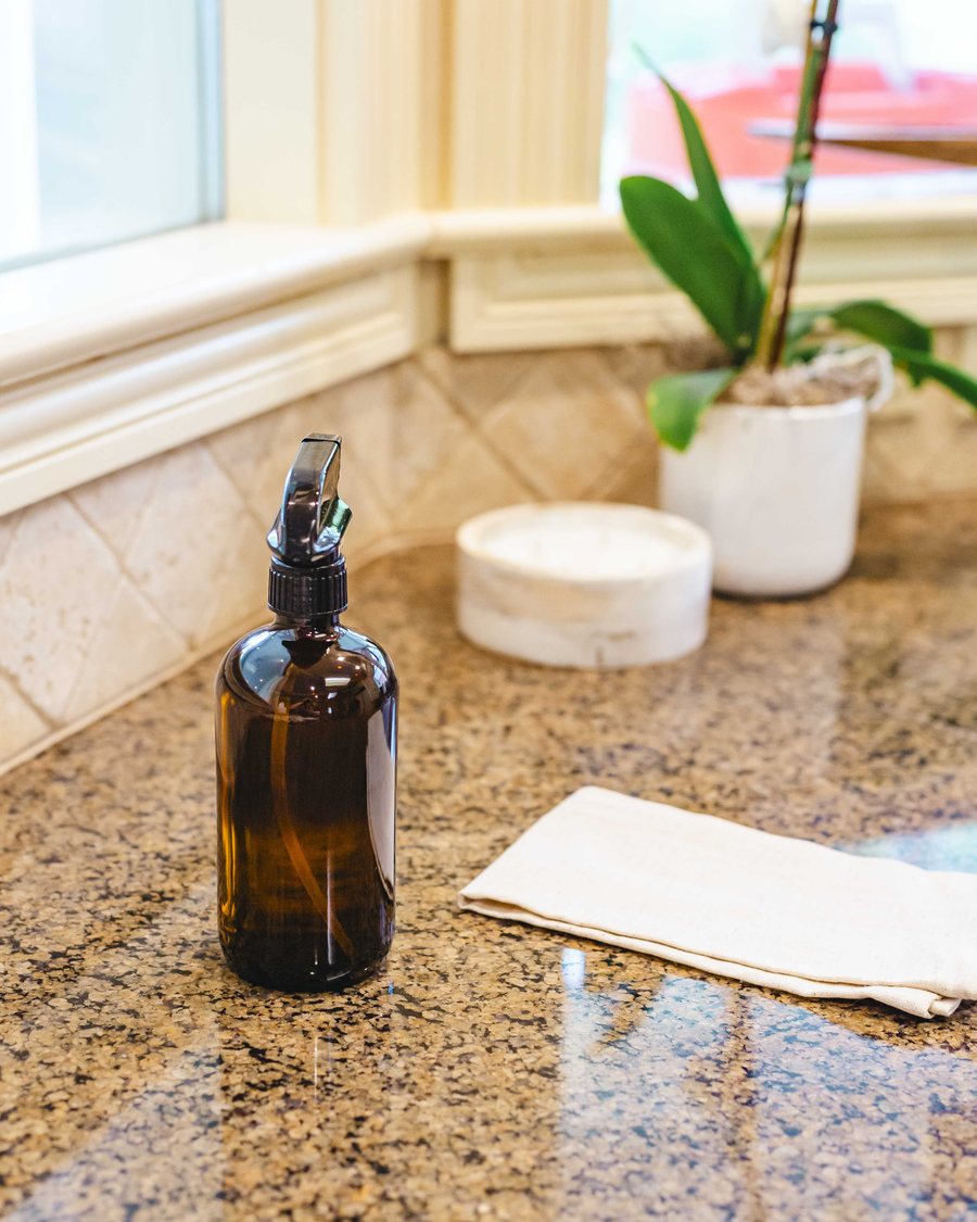 Styled product shot with amber glass bottles